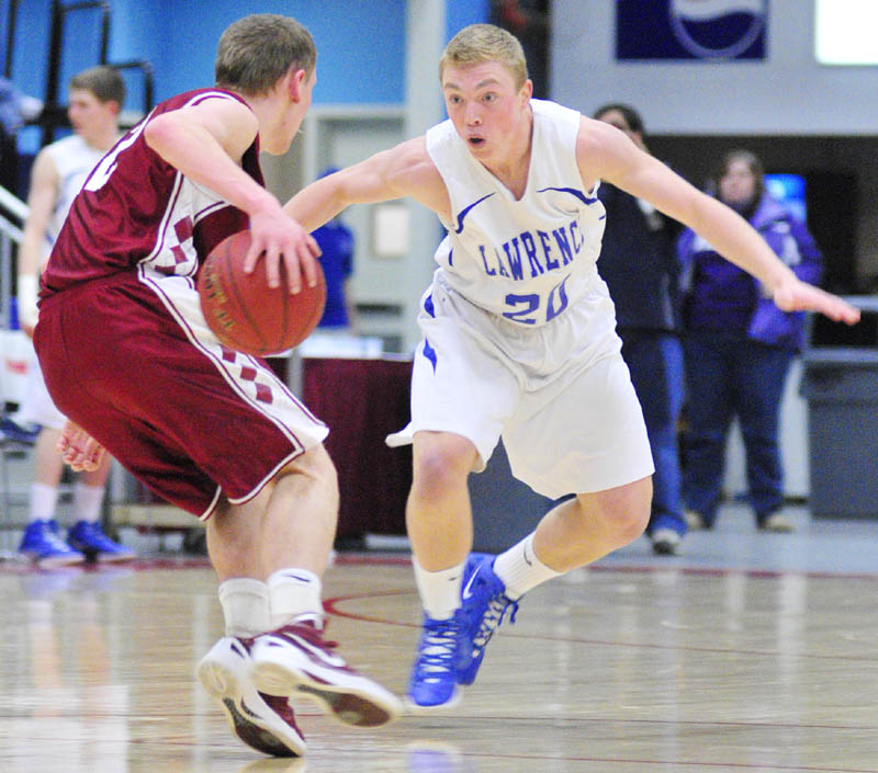 Bangor's John Szewczyk, left, keeps the ball away from Lawrence's Matt Saunders during the Class A East tournament on Saturday afternoon at the Augusta Civic Center.