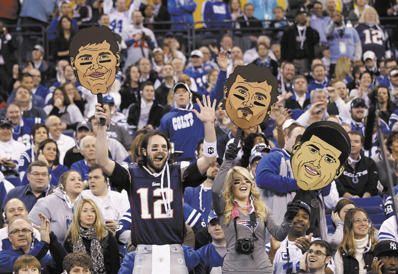 FANS TAKE IN MEDIA DAY: Fans cheer as the New England Patriots participate in Super Bowl Media Day on Tuesday in Indianapolis.