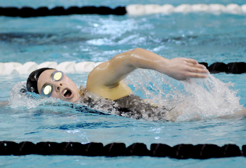 Emily Domingo of Greely competes in a 500-yard freestyle prelim at the Class B state meet. Domingo finished fourth in the final. Greely took the state title.
