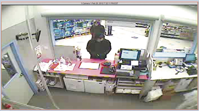 Two men are seen robbing a Rite Aid at 2007 North Belfast Ave. in Augusta Monday night. It was the second robbery at a city pharmacy in less than week.