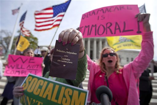 Protesters chant in front of the Supreme Court in Washington on Wednesday.