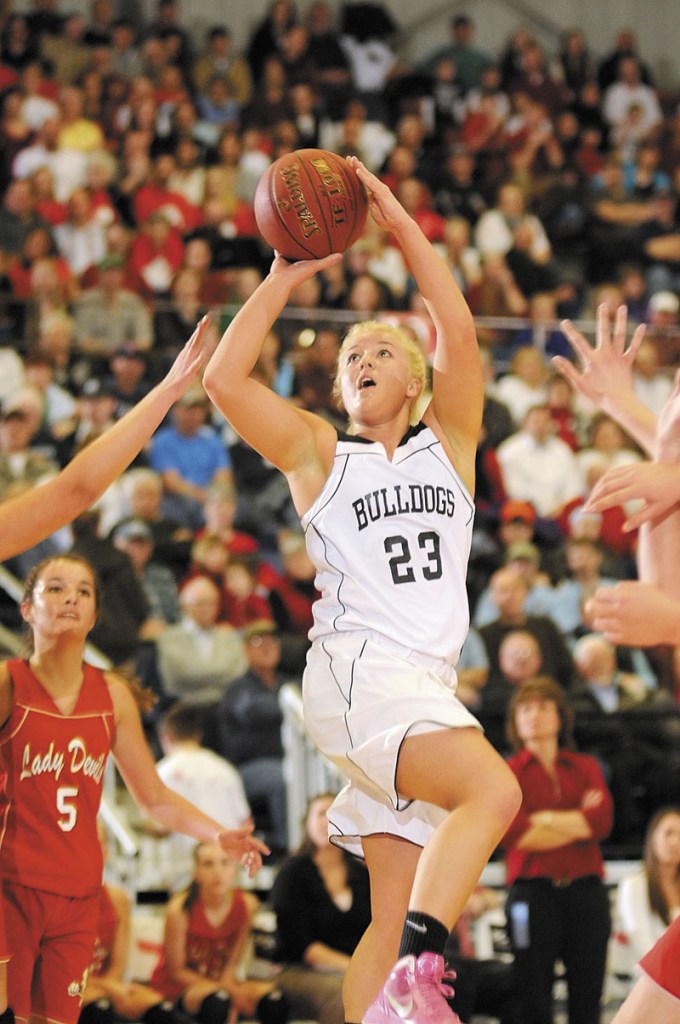 Carylanne Wolfington goes up for a shot against Central during the Class C state championship game on Saturday night at the Augusta Civic Center.