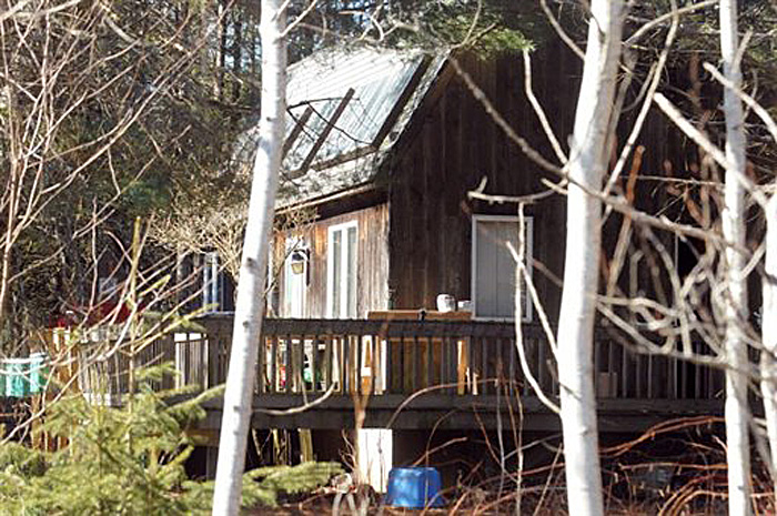 The Lamoine home where four people were shot, one fatally, during a confrontation on March 11.