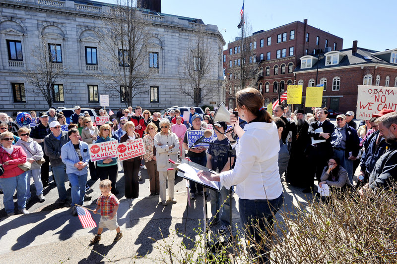Local organizer Leslie Sneddon of Richmond addresses demonstrators at the Stand Up for Religious Freedom rally in Portland on Friday afternoon. About 140 similar events were held across the country in the run-up to next week’s legal challenge of the Affordable Care Act of 2010 in the U.S. Supreme Court.