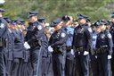 Hundreds of law enforcement officers from around New England line up to pay respect for Greenland Police chief Michael Maloney Wednesday April 18, 2012 in Hampton, N.H. during a wake service for the chief. Maloney was shot and killed when he and other officers were trying to serve a warrant at a Greenland home. Four other officers were injured.