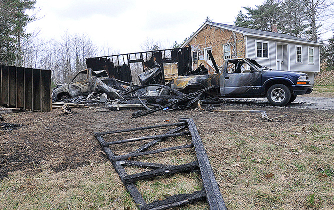 A fire at 215 Buck St. in Gorham that destroyed a two-car garage is the fourth suspicious fire in Gorham in two weeks.