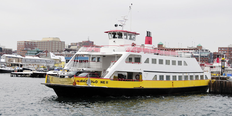 The Machigonne II, the Casco Bay Lines Ferry to Peaks Island, leaves the dock with cars and people.