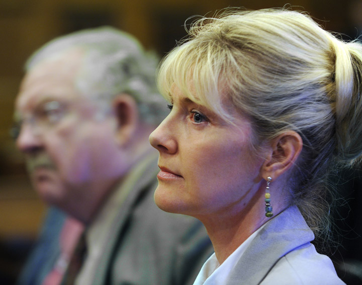 In this May 2010 photo, Linda Dolloff listens as e jury pronounces her guilty on all three counts in her attempted murder trial of her husband Jeffrey Dolloff.