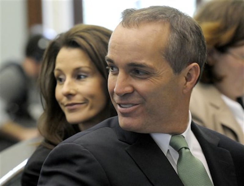 In this March 12, 2010 file photo, Andrew Young, former aide to former Sen. John Edwards, and his wife, Cheri, appear during a hearing at the Chatham County Superior Court House in Pittsboro, N.C. Prosecutors accuse Edwards of using campaign money from wealthy donors to hide his pregnant mistress, Rielle Hunter. Young testified for five days in the week ending Friday, April 27, 2012. He said Edwards knew the money was being spent to hide Hunter, but also acknowledged that he used much of the funds to build his North Carolina dream house. (AP Photo/Sara D. Davis, File)
