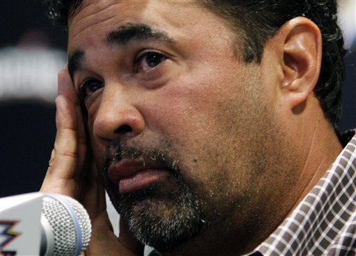 Miami Marlins manager Ozzie Guillen listens to a question during a news conference today at Marlins Stadium in Miami.