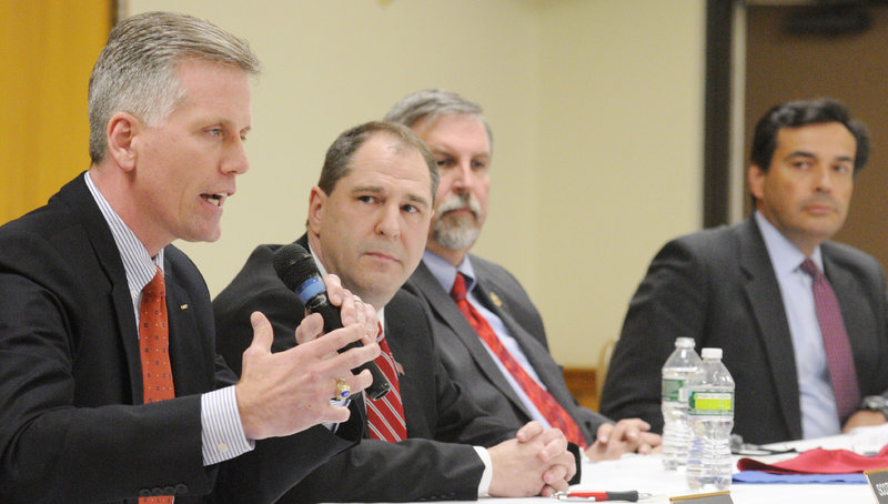 Charlie Summers, left, answers a question during the Republican candidate forum Friday night at the Elks Club in Augusta. The other candidates are, from left, Scott D’Amboise, William Schneider and Rick Bennett.