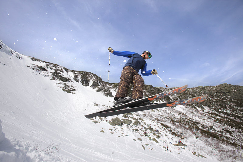 Eric Schaefer of Connecticut takes to the air after launching off a makeshift jump in Tuckerman Ravine in New Hampshire last week.