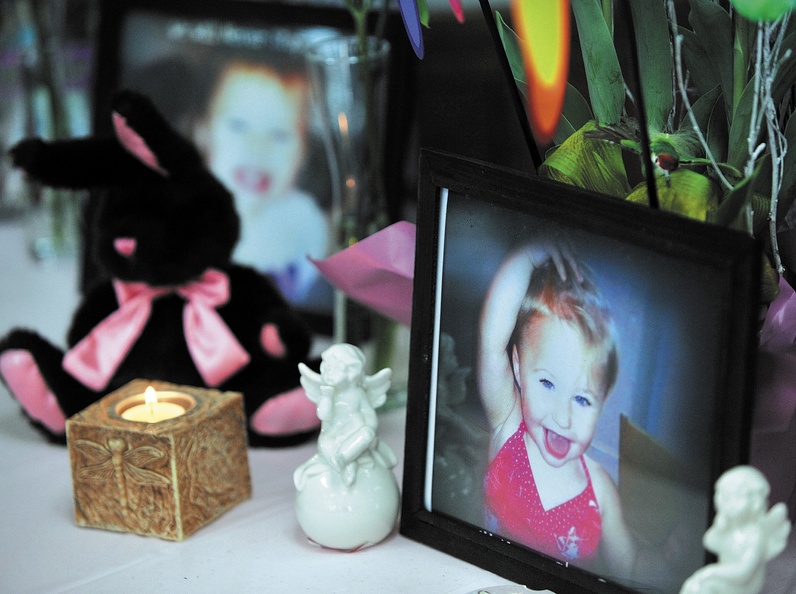 Michael G. Seamans/Morning Sentinel A small shrine with pictures and teddy bears honoring missing toddler Ayla Reynolds at a gathering in honor of the missing toddler at VFW Post 6924 in Fairfield in March.