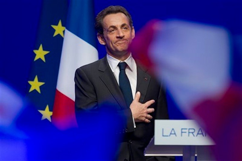 Outgoing French President Nicolas Sarkozy leaves after addressing supporters at his Union for a Popular Movement (UMP) party headquarters after the the preliminary results of the second round of the presidential elections were announced in Paris Sunday May 6, 2012. Socialist Francois Hollande defeated Sarkozy on Sunday to become France's next president, heralding a change in how Europe tackles its debt crisis and how France flexes its military and diplomatic muscle around the world. Sarkozy conceded defeat minutes after the polls closed, saying he had called Hollande to wish him "good luck" as the country's new leader. (AP Photo/Michel Euler)
