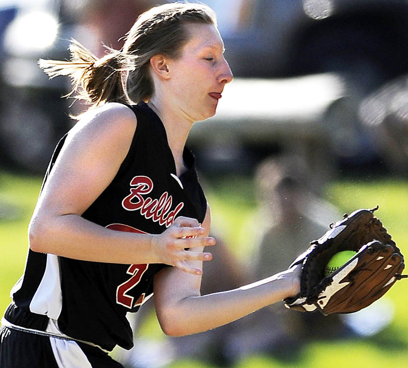 Staff photo by Andy Molloy GRAB: Hall-Dale High School's Emily Maynard snags a line drive Monday at second during a softball match up against Monmouth Academy at Monmouth.