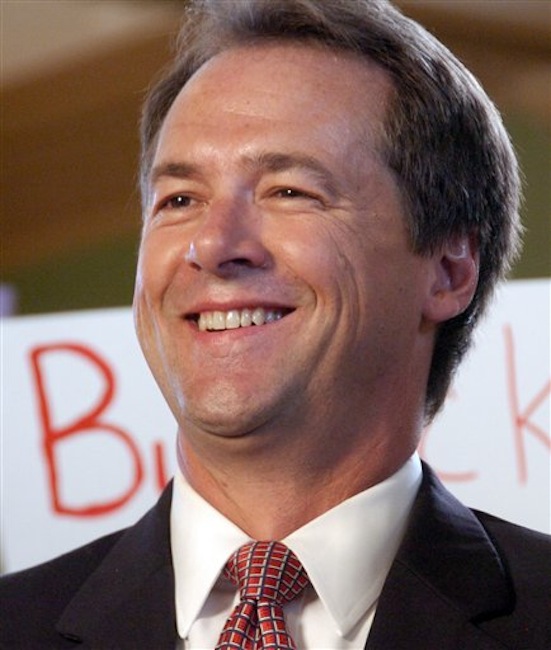 Montana Attorney General Steve Bullock is seen at an event in which he announced the start of his 2012 gubernatorial campaign on in this Sept. 7, 2011 file photo taken in Billings, Mont. Twenty-two states and the District of Columbia are backing Montana in its fight to prevent the U.S. Supreme Court's 2010 Citizens United decision from being used to strike down state laws restricting corporate campaign spending. Bullock argues that political corruption in the Copper King era led to the state ban on corporate campaign spending. A clarification of Citizens United is needed to make clear that states can block certain political spending in the interest of limiting corruption, he said. On Friday, May 18, 2012 Montana's case was given a boost when U.S. Sens. John McCain, R-Ariz., and Sheldon Whitehouse, D-D-R.I., signed on in support. (AP Photo/Matthew Brown, File)