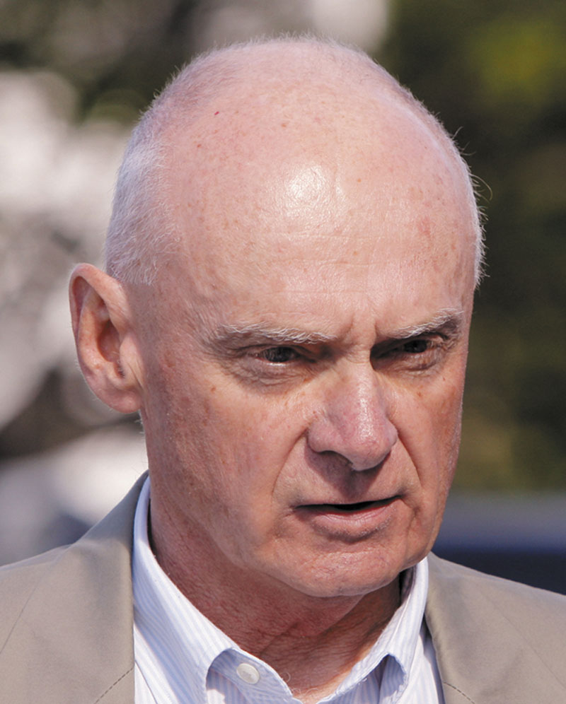 Irving Faunce, who adopted Gordon Collins-Faunce when he was nine years old, talks about the experiences of the past few weeks while outside York County Superior Court in Alfred on Friday.