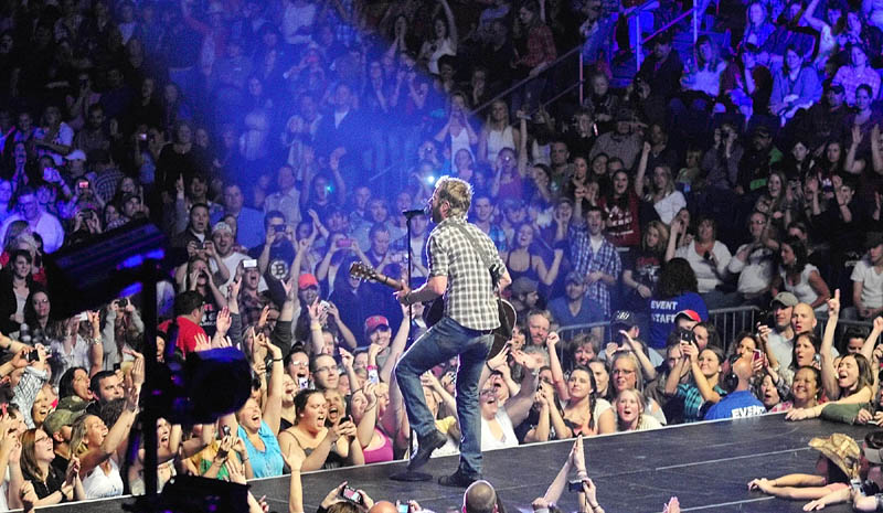 Fans screams as country star Dierks Bentley performs out on the apron of the stage on Thursday night at the Augusta Civic. About 3,000 fans attended the show, according to Civic Center director Dana Colwill.