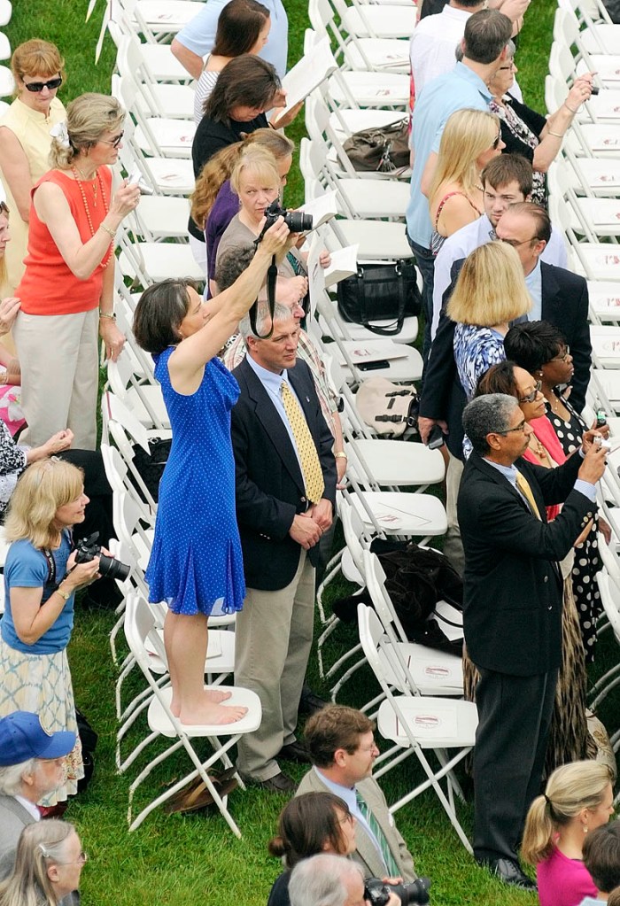 Audience members take photographs at the beginning of graduation ceremonies at Kents Hill School on Saturday morning in Readfield. There were 66 students in the 188th graduating class of the private preparatory school Saturday, Their 2012 class featured students from seven countries and 13 Maine communities.