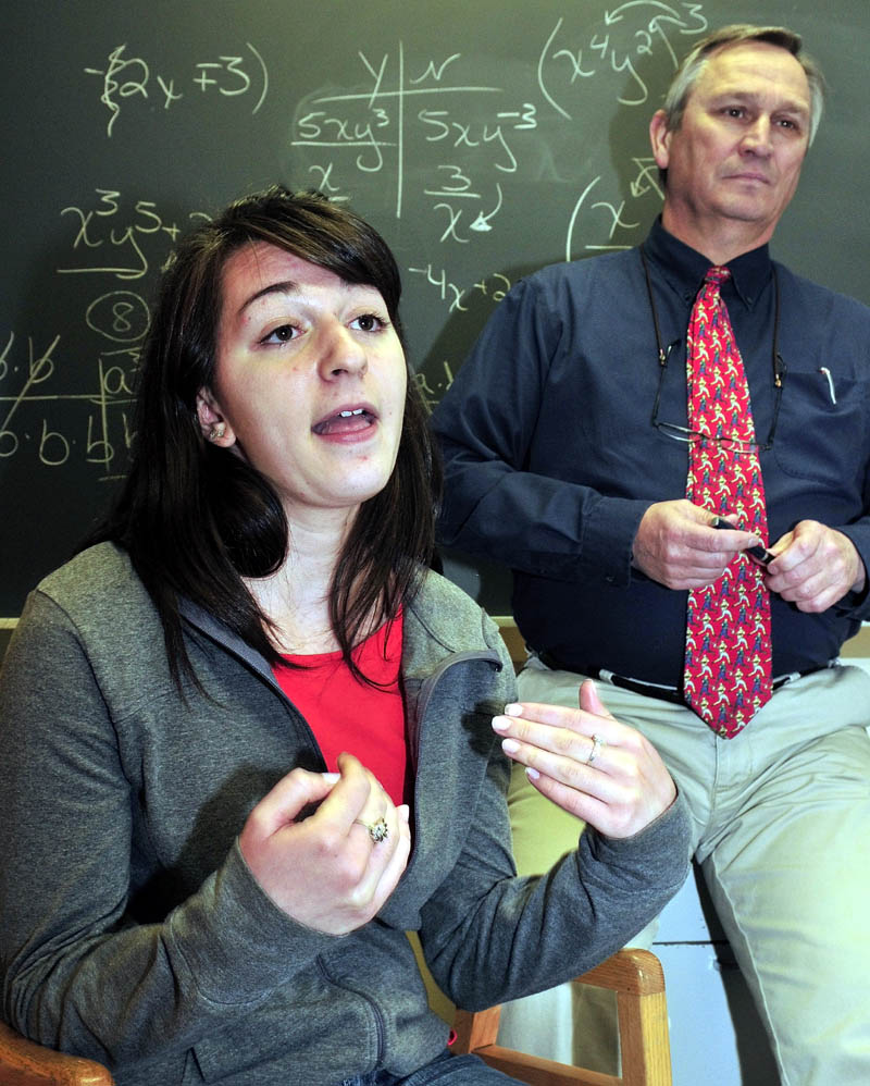 HEAD OF THE CLASS: Madison Area Memorial High School student Kristin Bishop speaks about being selected to serve as a student representative on the Maine State Board of Education. School Principal Stephan Ouellette is behind her.