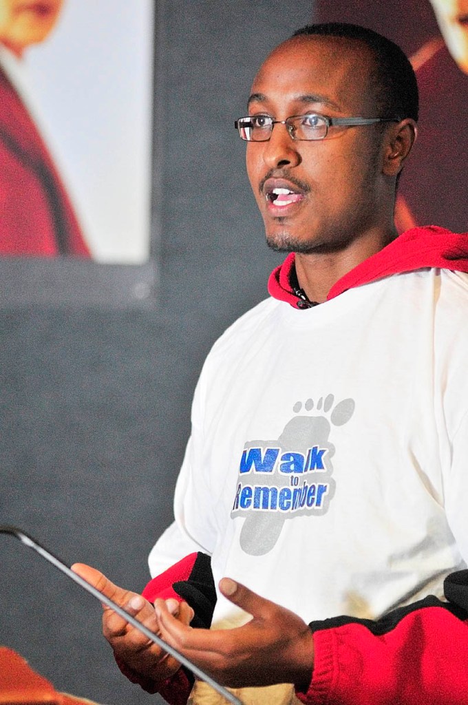 SPEAKER: University of Maine at Augusta senior Juste Tresor Gatari, a Rwandan native, speaks at Saturday’s Walk to Remember event at the Holocaust & Human Rights Center in Augusta.