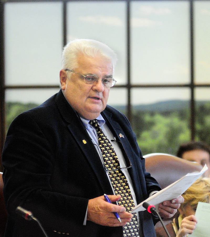 BOND PROPOSAL: Transportation Committee Chair Sen. Ronald Collins, R-Wells, speaks during a debate on the transportation bond Wednesday afternoon in the State House in Augusta.The Senate passed several bond bill including onf for $51.5 million to fund highways, bridges and other transportation projects.