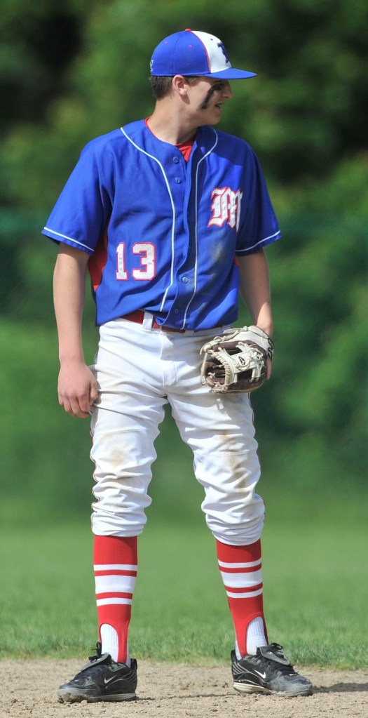 Staff photo by Michael G. Seamans Jake Dexter, 13, at second base against Oxford Hills High School at Thomas College in Waterville.