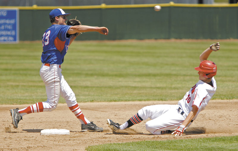 TURNING TWO: Jacob Dexter of Messalonskee turns a double play as Sam Terry of Scarborough of slides into second base during the Class A baseball state championship game Saturday at St. Joseph’s College in Standish.