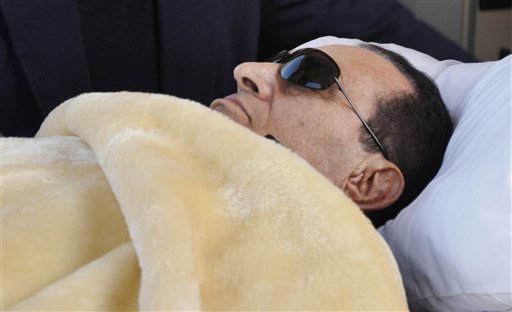 In this Jan. 29, 2012, photo, former Egyptian President Hosni Mubarak is wheeled into court in Cairo.