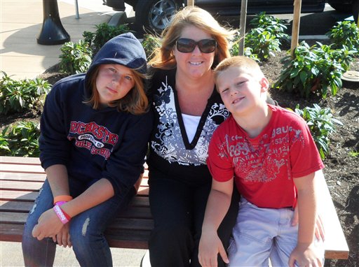 Sarena Haskins, center, with her children, Hannah, 12, at left, and Hayden, now 8, in Olympia, Wash. Sarena Haskins is a regular user of marijuana for medical reasons, as allowed by state law. But she is opposed to a measure on Washington's Nov. 6 ballot that would legalize pot for recreational purposes, and advises Hannah not to experiment with it.