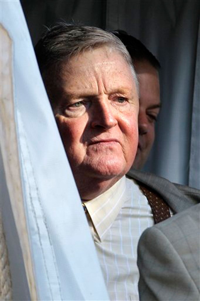 Penn State University assistant football on leave Mike McQueary's father John McQueary arrives at the Centre County Courthouse to testify in the child sexual abuse trial of former Penn State University assistant football coach Jerry Sandusky in Bellefonte, Pa., Wedneday, June 13, 2012. Sandusky is charged with 52 counts of child sexual abuse involving 10 boys over a period of 15 years. (AP Photo/Gene J. Puskar)