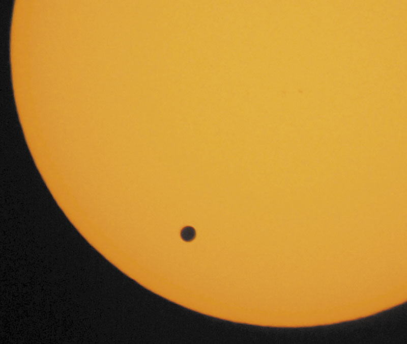 This June 8, 2004, photo shows the transit of Venus, which occurs when the Venus passes between the Earth and the Sun, is pictured in Hong Kong. Venus will cross the face of the sun on Tuesday, a sight that will be visible from parts of Earth, including Maine. This is the last transit for more than 100 years.