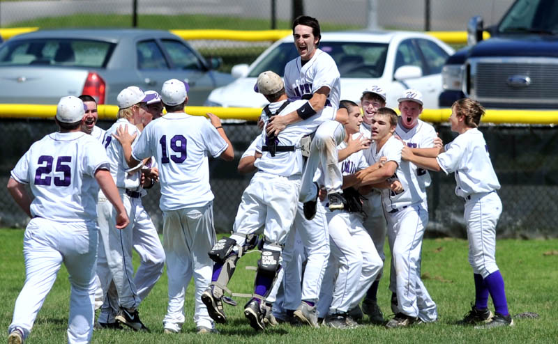 WOW: The Waterville baseball team celebratesafter rallying to a 14-13 win in an Eastern Maine Class B regional semifinal game Saturday in Waterville. At one point, the Panthers trailed 13-1.