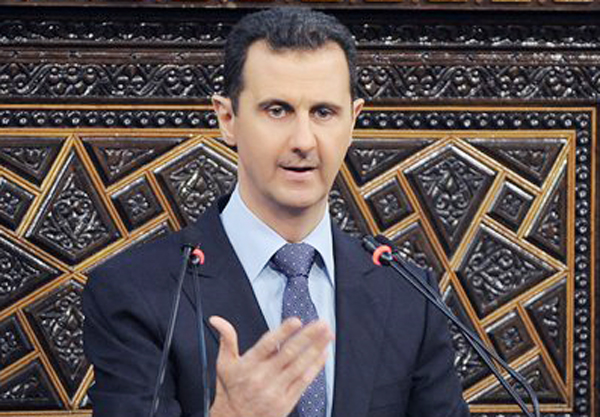 In this photo released by the Syrian official news agency SANA, Syrian President Bashar Assad delivers a speech to parliament in Damascus today.