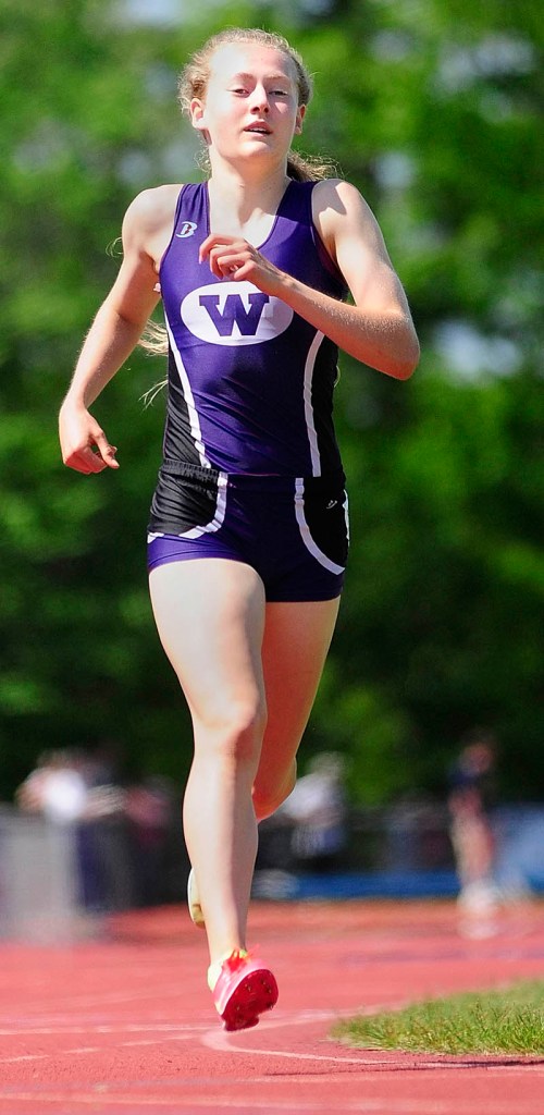 Staff photo by Joe Phelan Waterville's Bethanie Brown runs the 3200 meters by a large margin during the Kennebec Valley Athletic Conference championship track meet on Saturday in Bath.