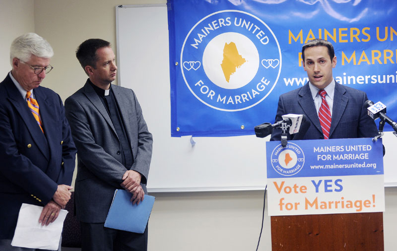 CAMPAIGN: Matt McTighe, campaign manager for Mainers United for Marriage, speaks during a press conference on Wednesday. To the left is John Paterson, the president of the board of directors for the ACLU of Maine and former deputy Maine Attorney General and Michael Gray, center, the pastor of Old Orchard Beach United Methodist Church and the lead signer on the citizens initiative.