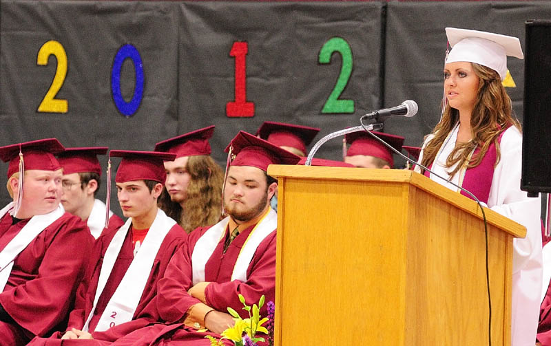 Danica Hurley reads her second honors essay about "Moving On" during graduation on Saturday afternoon at Richmond High School. There were 28 students graduating at the ceremony.