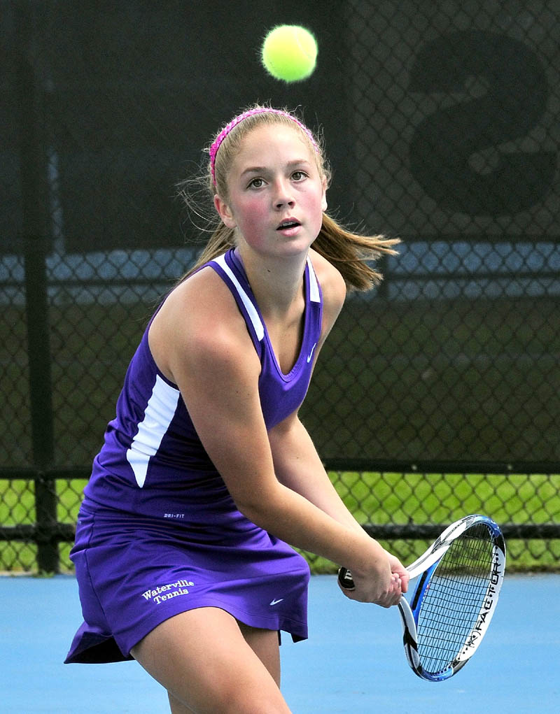 Staff photo by David Leaming Waterville's Colleen O'Donnell returns a shot during her 6-2, 6-3 win over Carlee Pinette in the Eastern Maine Class B championship match Wednesday in Waterville. Waterville won 4-1.