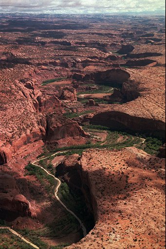 The Escalante River carves its way through sandstone landscape on its way to Lake Powell about 40 miles away to the south in this undated photo.