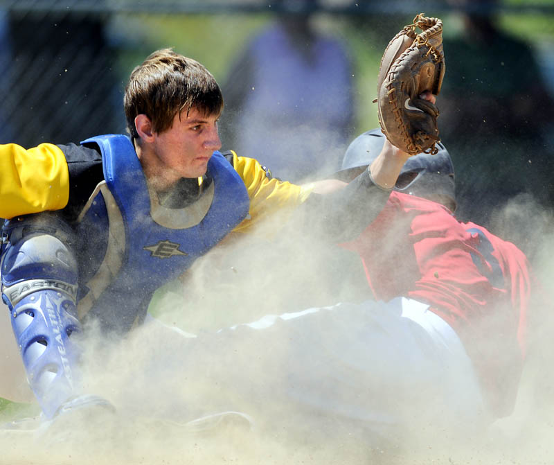 CLOSE PLAY: South China Subway catcher Keith Cloutier tags out Post 51’s Josh Doolan at the plate Sunday during Post 51’s 11-10 win in the Zone 2 American Legion tournament in Augusta.