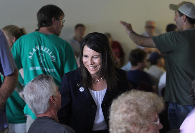 Rep. Maeghan Maloney, D-Augusta, chats with attorney Tom Tilton of Waterville prior to a special meeting to nominate either her or acting District Attorney Alan Kelley of West Gardiner as the Democrat candidate to succeed Evert Fowle. The meeting was held at the Poulin-Turner Union Hall in Skowhegan.