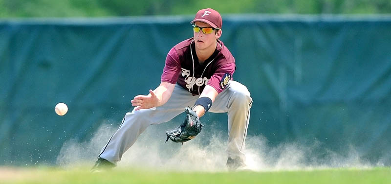 IN POSITION: Franklin County shortstop Jimmy Neal fields a groundball in the second game of an American Legion Zone 2 doubleheader against Subway on Saturday in Waterville.