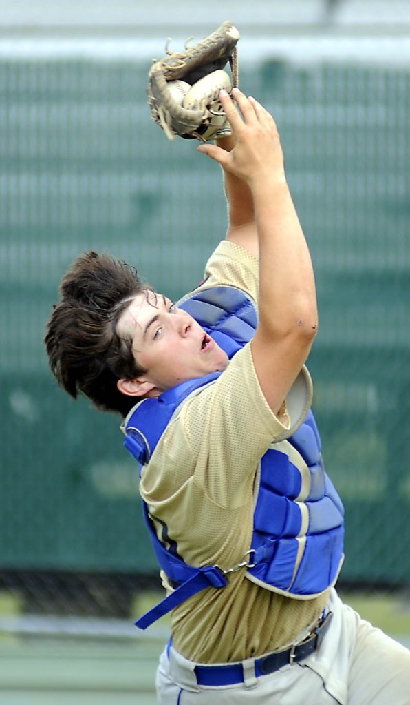 MAKING THE PLAY: Madison catcher Garrett Emery catches a foul pop Sunday during an American Legion baseball Zone 2 tournament game against Post 51 on Sunday in Augusta.