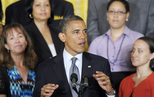 President Barack Obama calls on Congress to pass a temporary, one-year extension of the Bush-era tax cuts for people who make less than $250,000 a year, during a statement in the East Room of the White House in Washington, today.