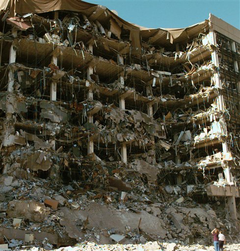 This April 19, 1995 file photo shows rescue workers standing in front of the Alfred P. Murrah Federal Building following an explosion in downtown Oklahoma City. Sony Electronics and the Nielsen television research company collaborated on a survey ranking TV's most memorable moments. Other TV events include, the Sept. 11 attacks in 2001, Hurricane Katrina in 2005, the O.J. Simpson murder trial verdict in 1995 and the death of Osama bin Laden in 2011. (AP Photo/David Longstreath, File)