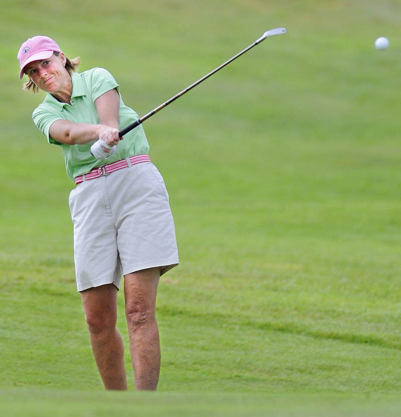 WATCH IT FLY: Leslie Guenther drives during the second day of the Maine Women’s Amateur on Tuesday at the Augusta Country Club in Manchester.