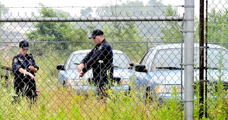 Maine State Police officers prepare to search near the Brookfield dam in Winslow on Tuesday for evidence of missing toddler Ayla Reynolds.