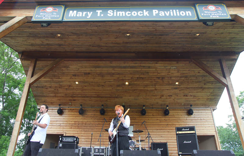 BETTER THAN: J.D. Raines on lead vocals leads Better Than at the 2nd annual Battle of the Bands at Fort Halifax Park in Winslow on Sunday. Joining Raines on stage is Justin Chaffee, on bass, and his brother Zach Chaffee, on drums. The event was part of Winslow Family 4th of July Celebration.