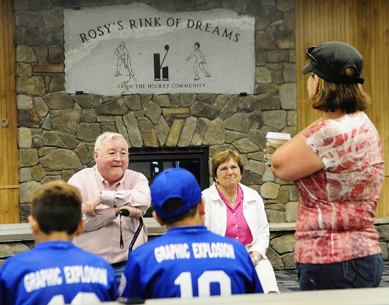 Co-owners Peter, facing left, and Sandra Prescott chat with Owen Cox, far left, and Ryan Pomerleau and Sheri Pomerleau in the warming room in The Bank of Maine Ice Vault on Saturday in Hallowell. The boys, who said they were hockey players in addition to being baseball players, were wearing cleats, but co-owner Peter Prescott suggested that the borrow some rental skates and try out the ice out, so they did.