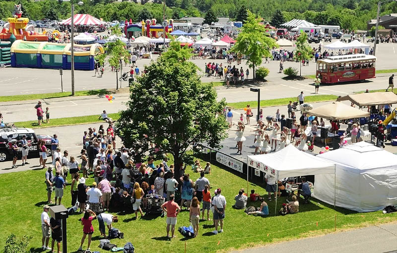 The dance stage for Saturday’s Whatever Family Festival Kid’s Day event was on the lawn by the Augusta Civic Center, while the rest of the day’s events were in the center’s parking lot.